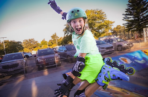 Young girl roller blading