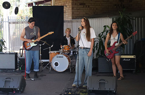 Band singing on stage