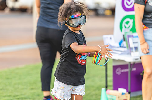 Young boy playing throwing game