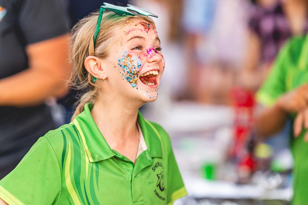Young girl with a painted face